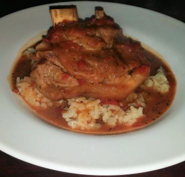Glazed duck with risotto fine dining
